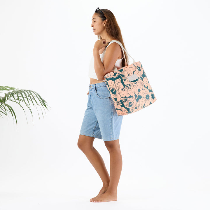 https://cdn.shopify.com/s/files/1/1119/6322/files/DT_flor_del_mar_dark_teal_on_peachy_f2_op.jpg?v=1770420659