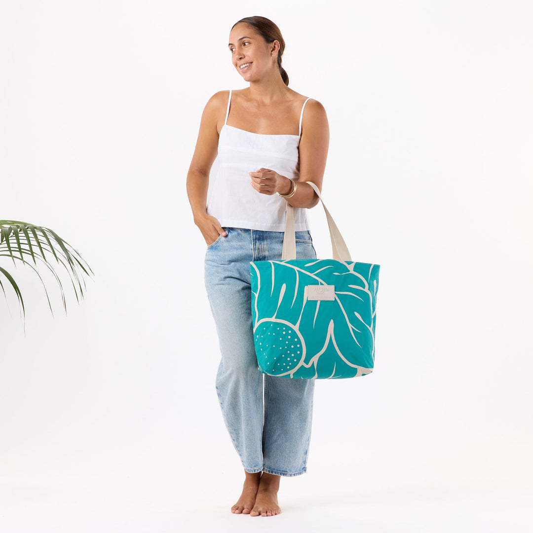 https://cdn.shopify.com/s/files/1/1119/6322/files/DT_ulu_nui_teal_on_sandstone_f1_op.jpg?v=1770769622