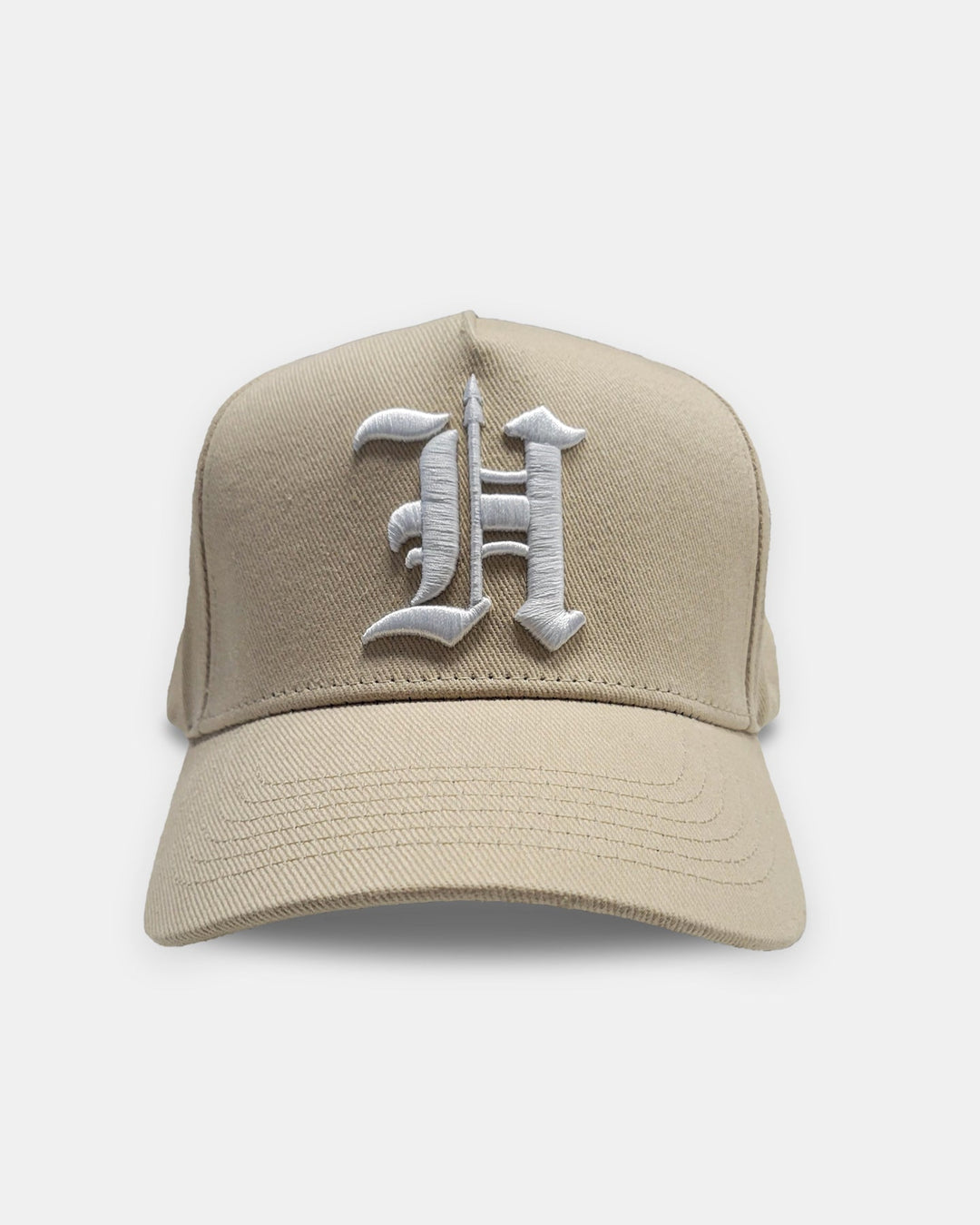 https://cdn.shopify.com/s/files/1/0063/2122/files/H-Spear_TAN-WHT_FR.jpg?v=1765830210