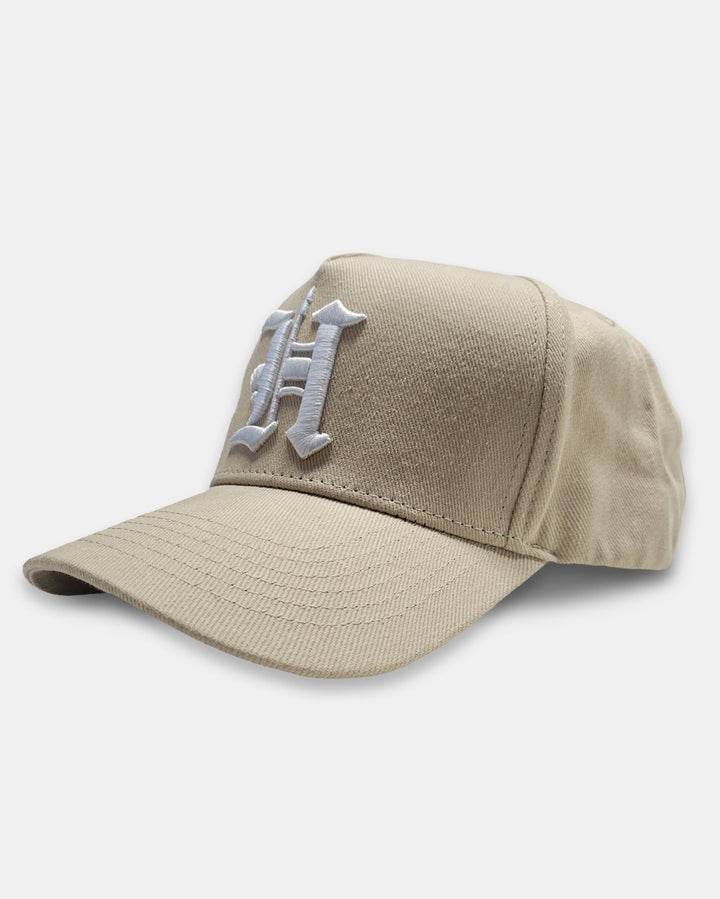 https://cdn.shopify.com/s/files/1/0063/2122/files/H-Spear_TAN-WHT_SIDE.jpg?v=1765830210