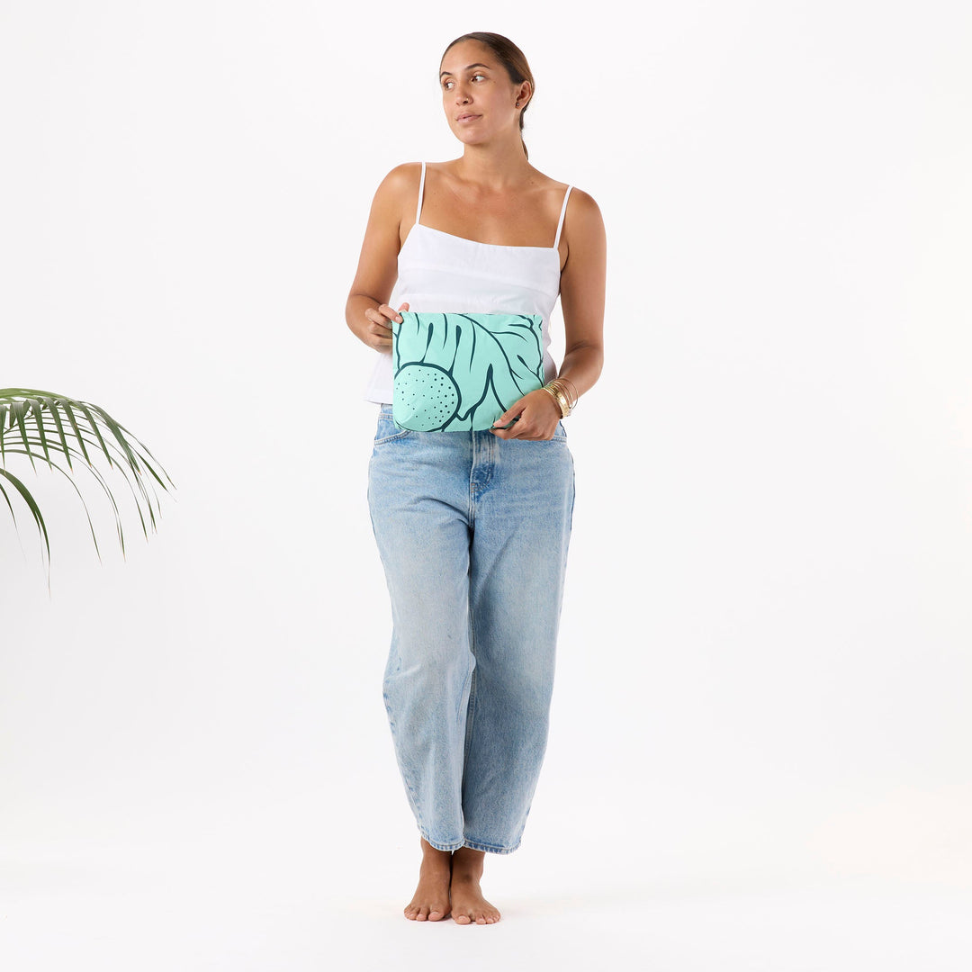 https://cdn.shopify.com/s/files/1/1119/6322/files/mid_ulu_nui_dark_teal_on_splash_f1_op.jpg?v=1770770678