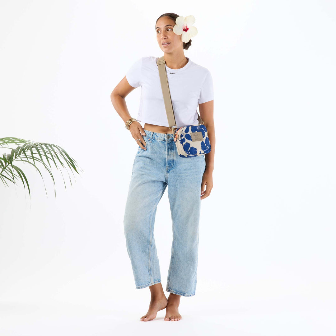 https://cdn.shopify.com/s/files/1/1119/6322/files/nylon_le_tour_salina_tiny_stripe_navy_f2_op.jpg?v=1768005484