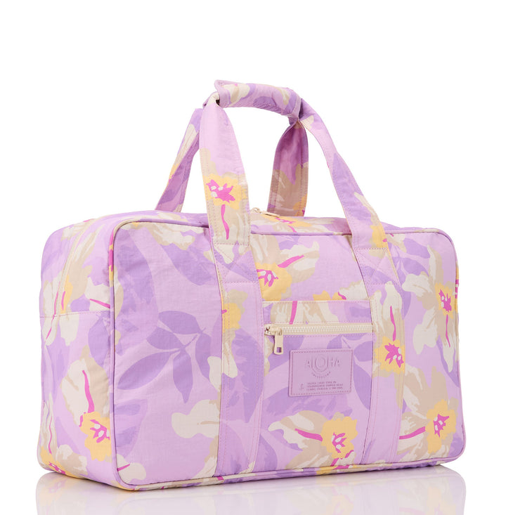 https://cdn.shopify.com/s/files/1/1119/6322/files/nylon_weekender_Makana_Lavander_2_op.jpg?v=1768945315