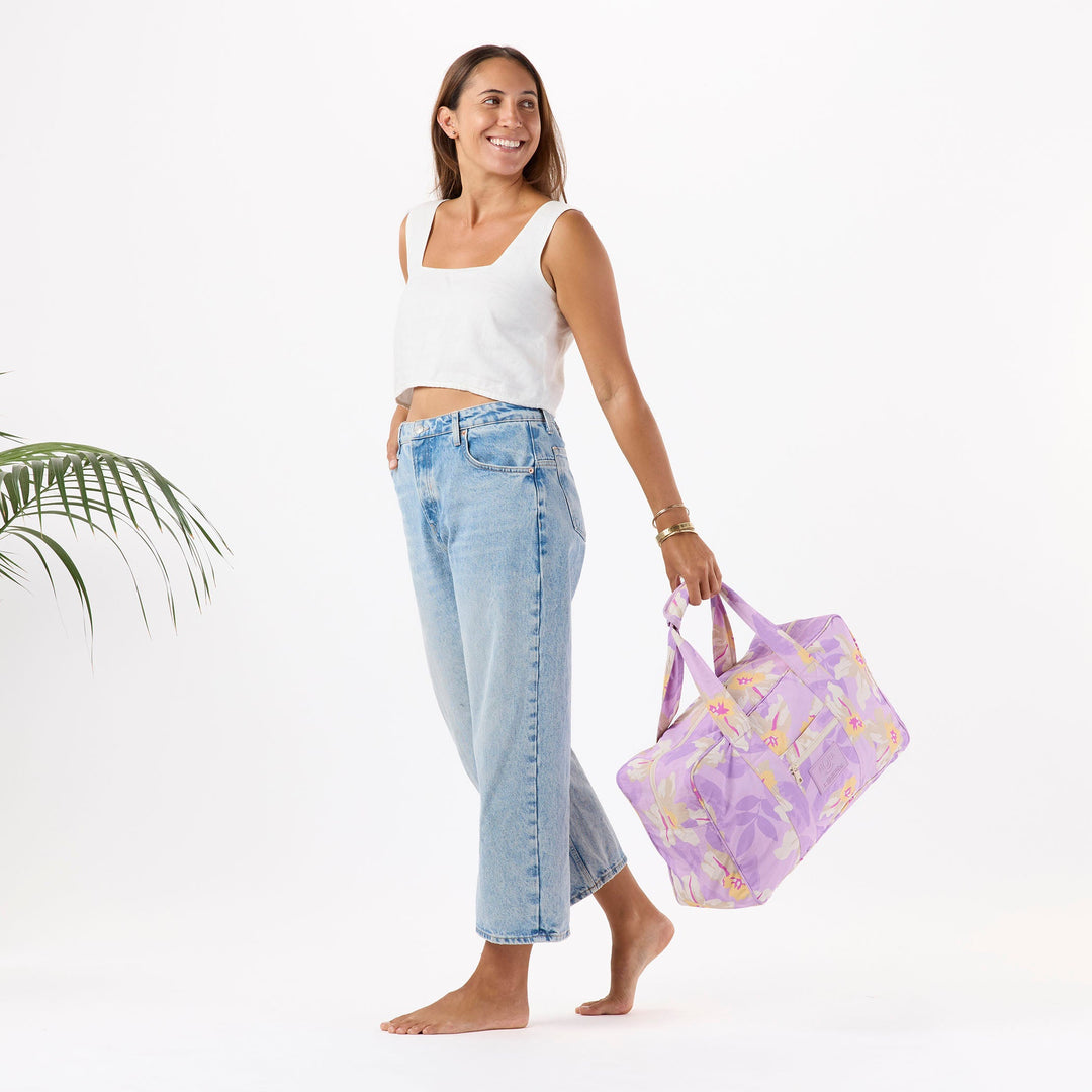 https://cdn.shopify.com/s/files/1/1119/6322/files/nylon_weekender_makana_lavande_f1_op.jpg?v=1768945315