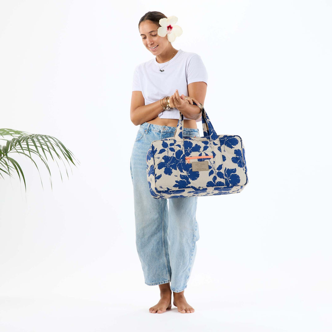 https://cdn.shopify.com/s/files/1/1119/6322/files/nylon_weekender_salina_tiny_stripe_navy_f2_op.jpg