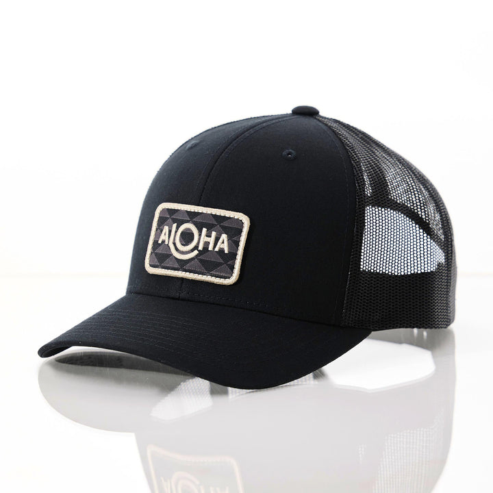 ALOHA Label Retro Trucker Hat in Black