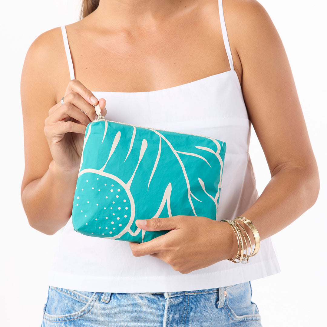 https://cdn.shopify.com/s/files/1/1119/6322/files/sm_ulu_nui_teal_on_sandstone_cu1_op.jpg?v=1770770180