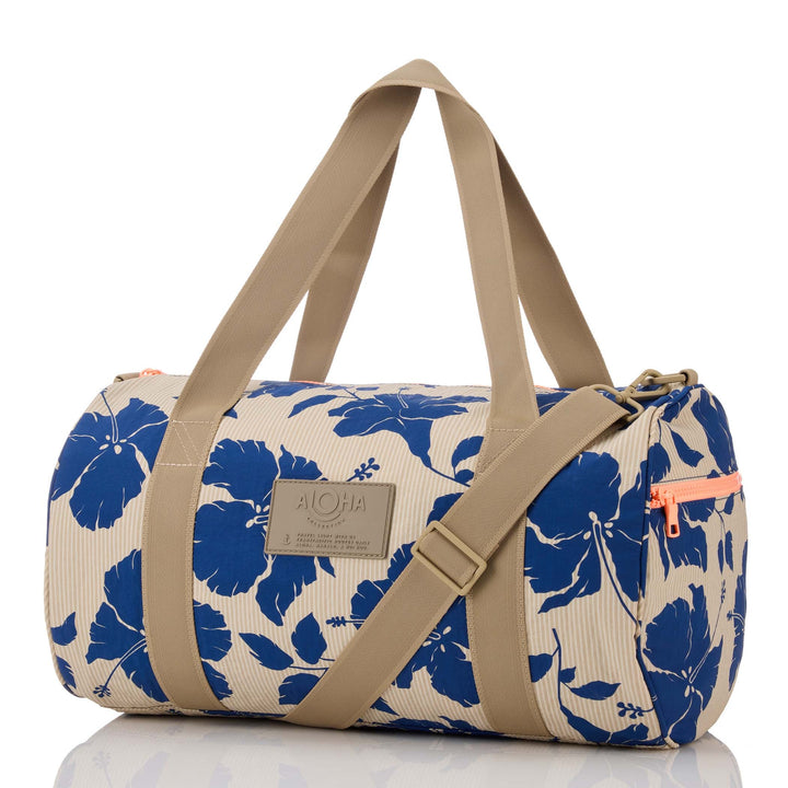 https://cdn.shopify.com/s/files/1/1119/6322/files/sporty_duffle_salina_tiny_stripe_navy_1_op.jpg?v=1768005573