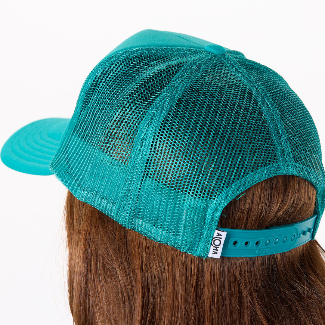 https://cdn.shopify.com/s/files/1/1119/6322/files/trucker_hat_lei_aloha_jade_cu2.jpg?v=1768506283